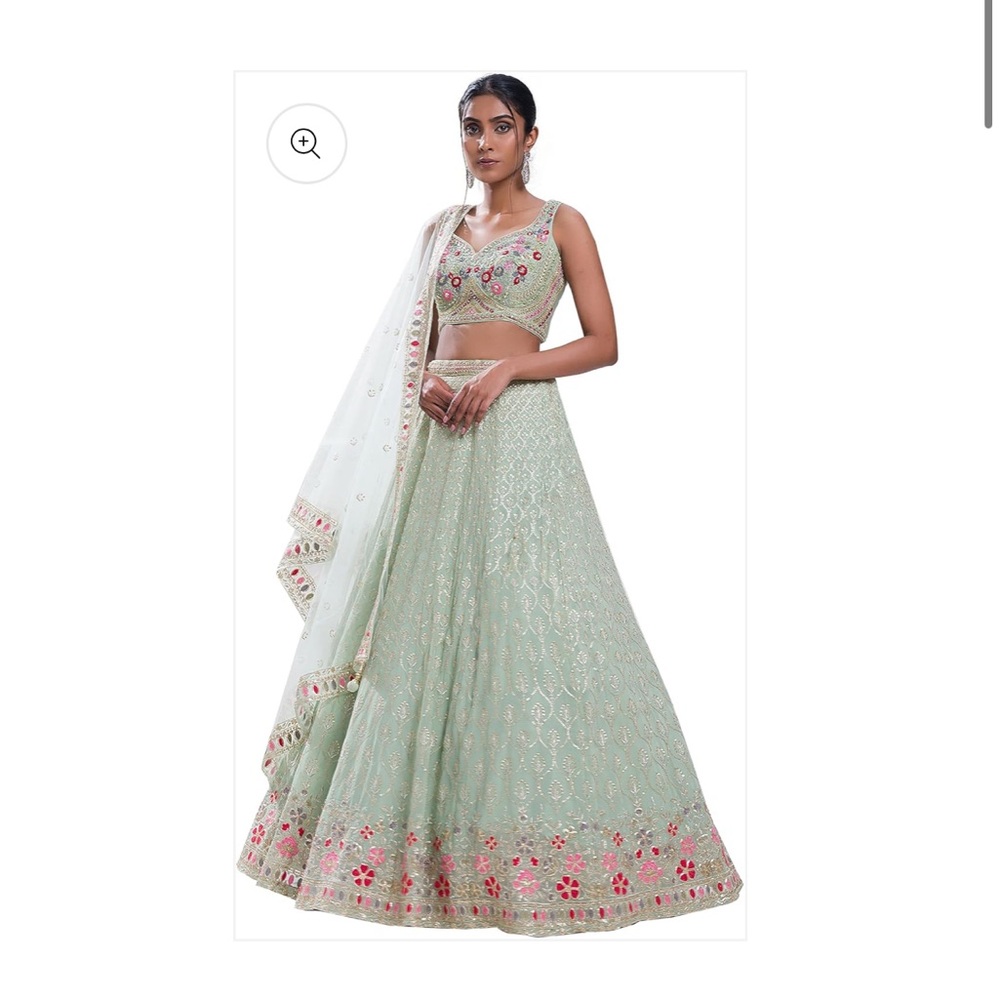 Pastel Green Embroidered Lehenga with Pink Accents
